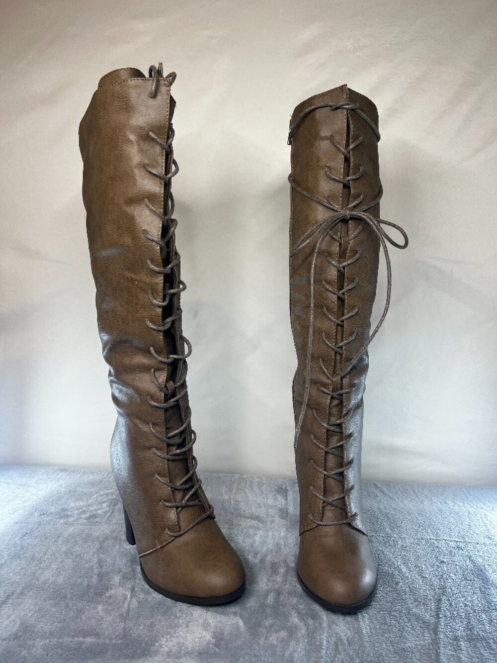 Venus knee high lace boots with side zip closure. NWOB Size 6